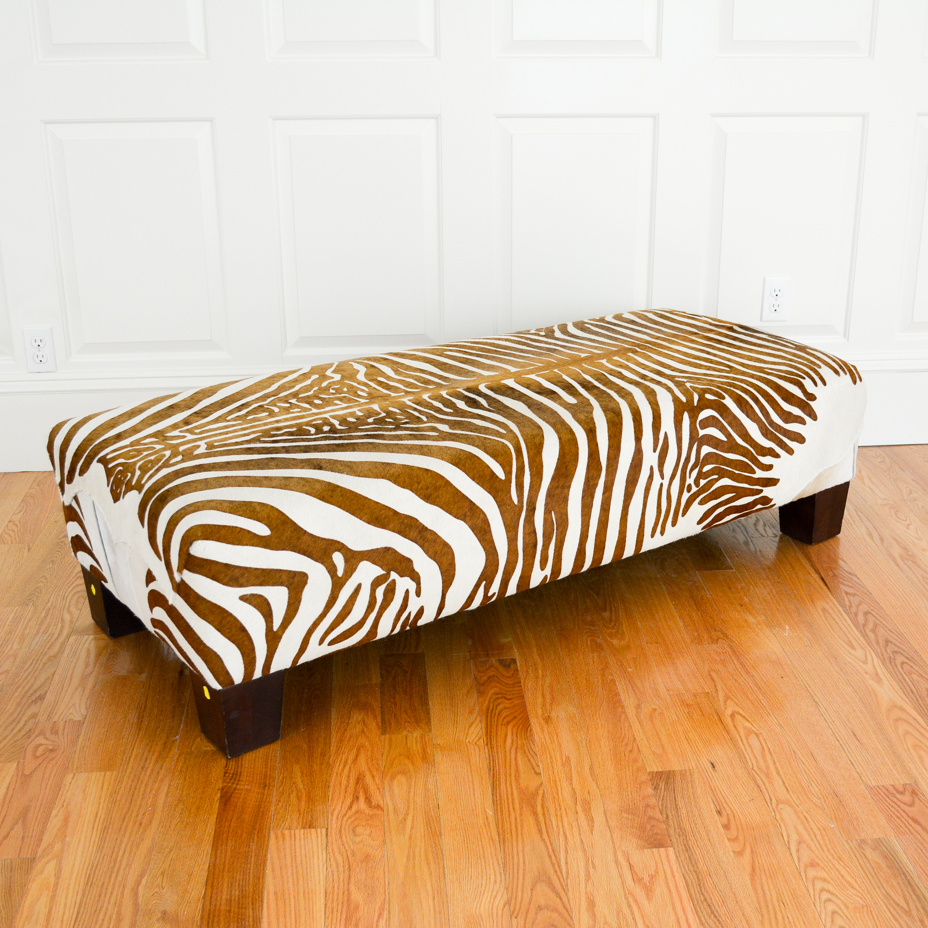 lot-1216_hide-upholstered-zebra-print-bench